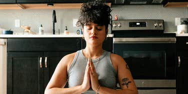 Healthy person meditating. 