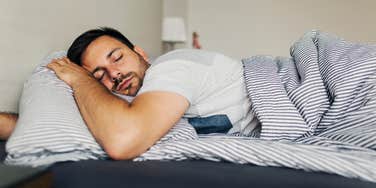 exhausted man taking pto sleep
