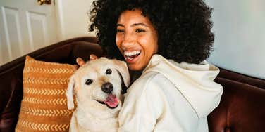 Woman with her special, enchanted pet. 