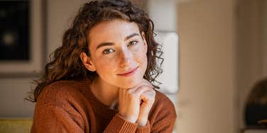 woman thinking about her guilty pleasure