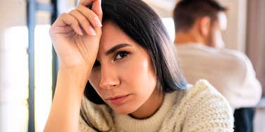 Woman who realizes partner is not the right person for her. 