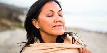 Woman manifesting a peaceful, compassionate society.