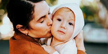 Child that feels safe and happy with parent.