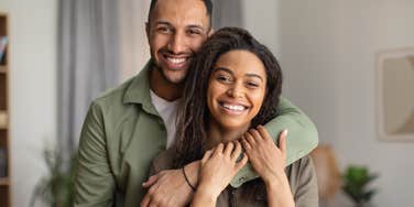 couple hugging loving each other from depths of their souls