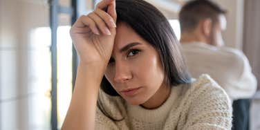 unhappy wife turned away from husband