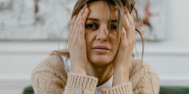 female worker engaging private activity crying job