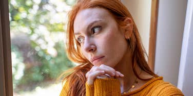 young spiritual woman distancing herself from religion