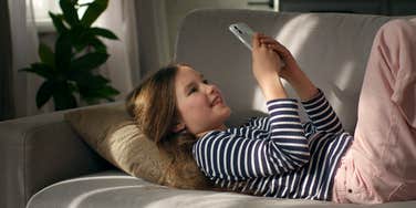 young girl on smartphone