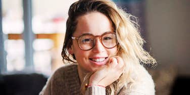 Smiling person showing kindness and warmth, representing the simple habits of naturally nice people