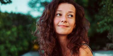 Woman keeping calm, easing her anxious thoughts. 