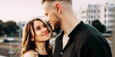 Couple rebuilding trust in relationship after fallout. 