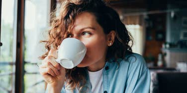 woman drinking coffee