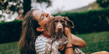 woman doing things make dog feel respected