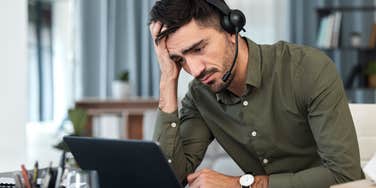 stressed out employee working at desk