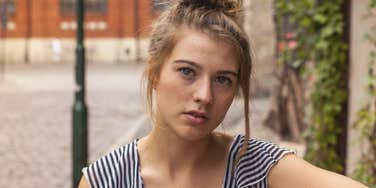 narcissistic woman looking annoyed shes not getting her way