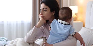 worried mom with baby