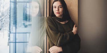 woman who has had a difficult life stressing at home