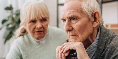 older couple looking sad missing their kids