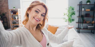 woman who has her life together opening door to home