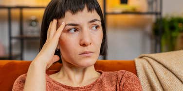 sad woman unhappy with her life looking stressed out