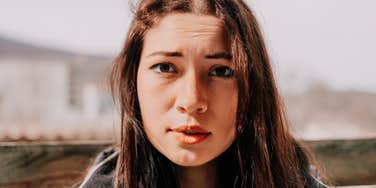 smart young woman feeling insecure about her intelligence