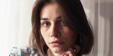 sad serious young woman using coping mechanisms