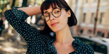 rare and intimidating woman posing outside