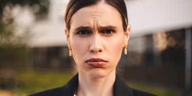 irritated businesswoman who works hard for her money