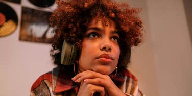 woman listening sad songs instead happy ones