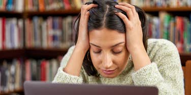 woman distracted while working
