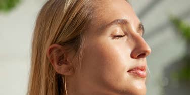 Woman maintains inner peace.