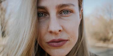 empathic woman exhausted from absorbing emotions of others