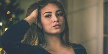 beautiful young woman thinking about older generations