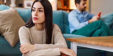 disappointed wife turned away from husband