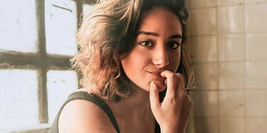 An anxious person learning mindfulness and emotional balance, showing how anxiety sufferers find inner peace, calm, and self-acceptance through healing habits.