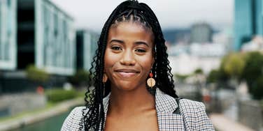 Happy employee leaving work on time showing the art of balance and the small signs a company respects life outside work.