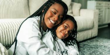 Mother who never had a good role model, raising a happy child. 