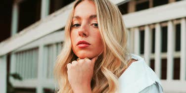 Heartbroken person sitting alone showing the art of starting over and hidden truths behind why being ghosted cuts so deep.