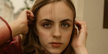 Woman silences toxic drama by staying calm.