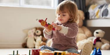 child playing with toys