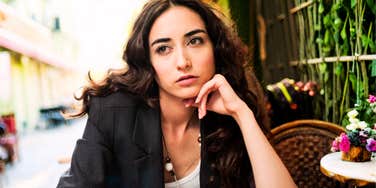 Offended woman reacting emotionally, illustrating common phrases that trigger a partner’s past wounds and healthier ways to communicate instead.