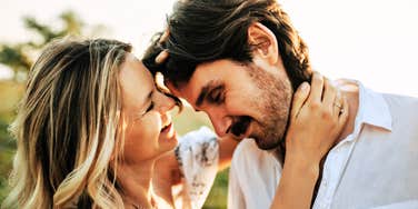 Couple talking intimately, illustrating conversations that indicate emotional maturity and strong communication in relationships