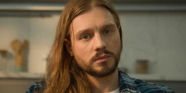 quiet serious man struggling wtih emotions