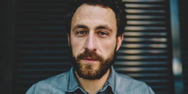 man pretending to be interesting looking serious