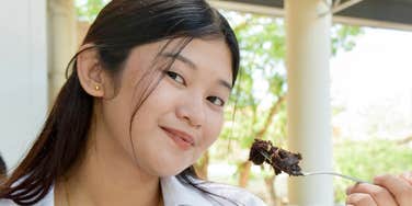 Person starts morning with dessert.