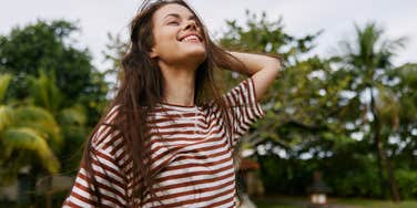woman who loves taking pictures enjoying life