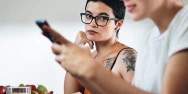 Woman at end of honeymoon phase irritated at partner's loss of chemistry 