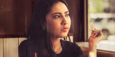 Person thinking about a message from an ex with confusion and clarity showing the signs your ex is testing you and what to do next