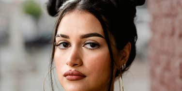 Woman has karmic debt.