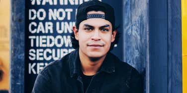 Uncomfortable man highlighting the signs someone is literally the opposite of your soulmate.